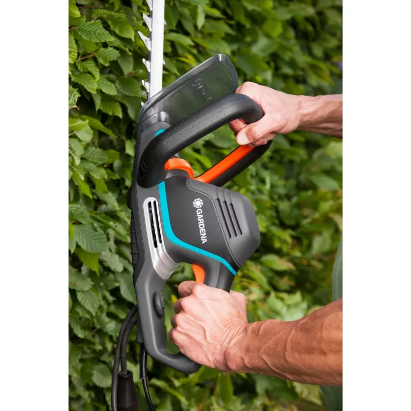 Gardena Elektro-Heckenschere PowerCut 700/65, 65 cm, Doppelmesser, 2,7 cm, Orange, Schwarz, Blau, 3,1 m/s², 87 dB