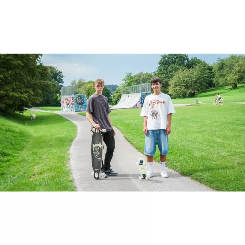Longboard Muuwmi Lights GLOW ABEC 7 mit leuchtenden Rollen, schwarz/grün