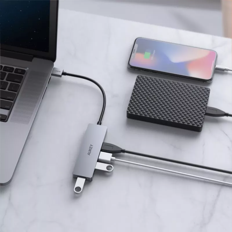 USB-Hub Aukey CB-H36 — 4-Port USB 3.2 Gen 1 Typ-A, Host USB 2.0, 5000 Mbit/s, Aluminium Silber