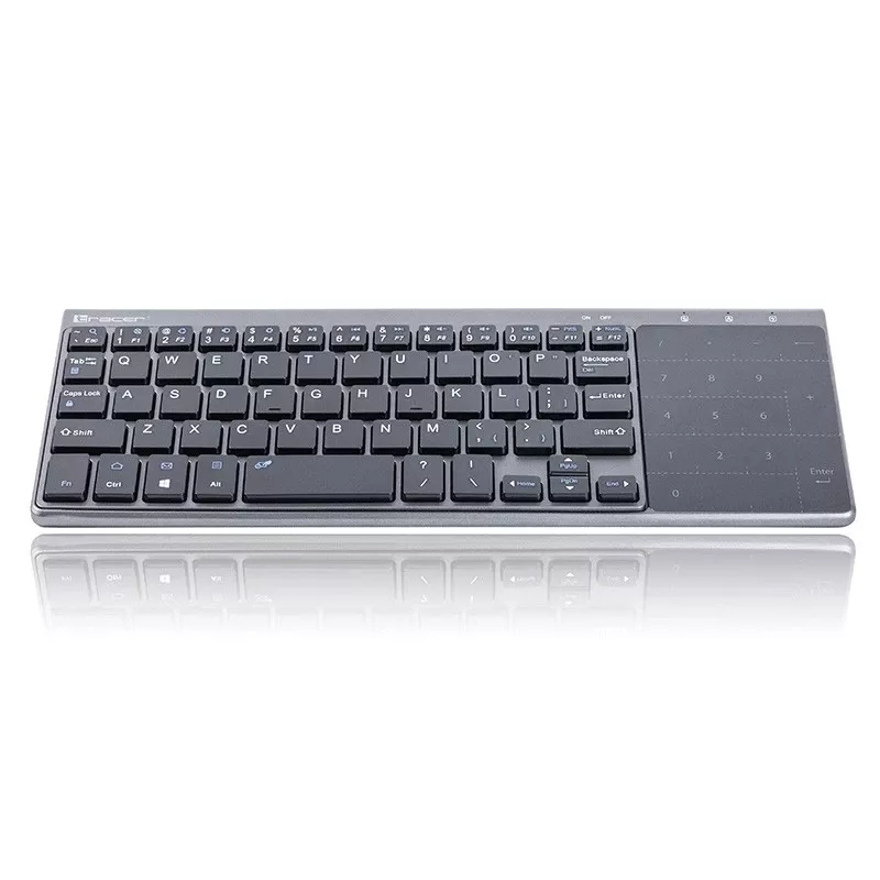 Tracer EXpert RF ist eine ergonomische Full-Size-Funktastatur mit QWERTY-Layout, Membran-Tastenschaltern und einem schlanken schwarz-grauen Design. Konzipiert für den Einsatz zu Hause und im Büro, kombiniert sie ein integriertes Touchpad und Multimedia-Tasten mit einer 2,4-GHz-Funkverbindung, um eine kompakte Eingabelösung für Fernseher, Konsolen, Notebooks und klassische PCs zu bieten.