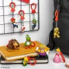 Backpack Buddies Schlüsselanhänger-Set Paladone Super Mario VKE mit 24 Stück – verschiedene Charaktere, Sammleraccessoires