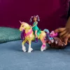 Mini-Puppenset Usorteret Unicorn Academy Ava & Leaf Power of Friendship mit durchscheinendem Sattel und 2 Zubehörteilen, 168 mm, Kunststoff