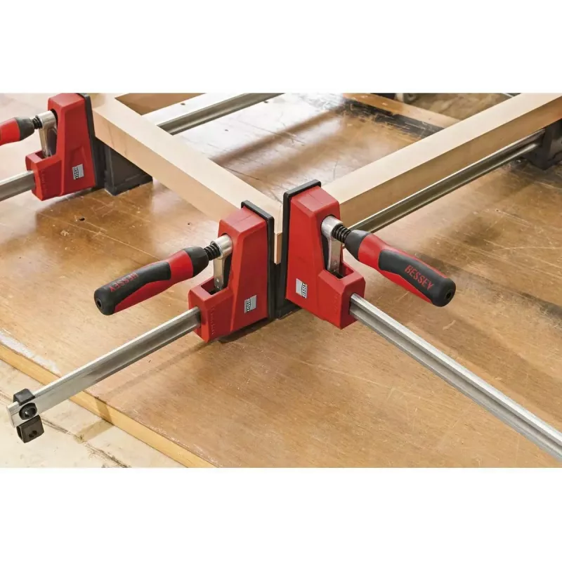 Bessey Korpuszwinge REVO KRE 1250/95 (Modell KRE125-2K) - verstellbare 1250 mm Schiene, 95 mm Ausladung