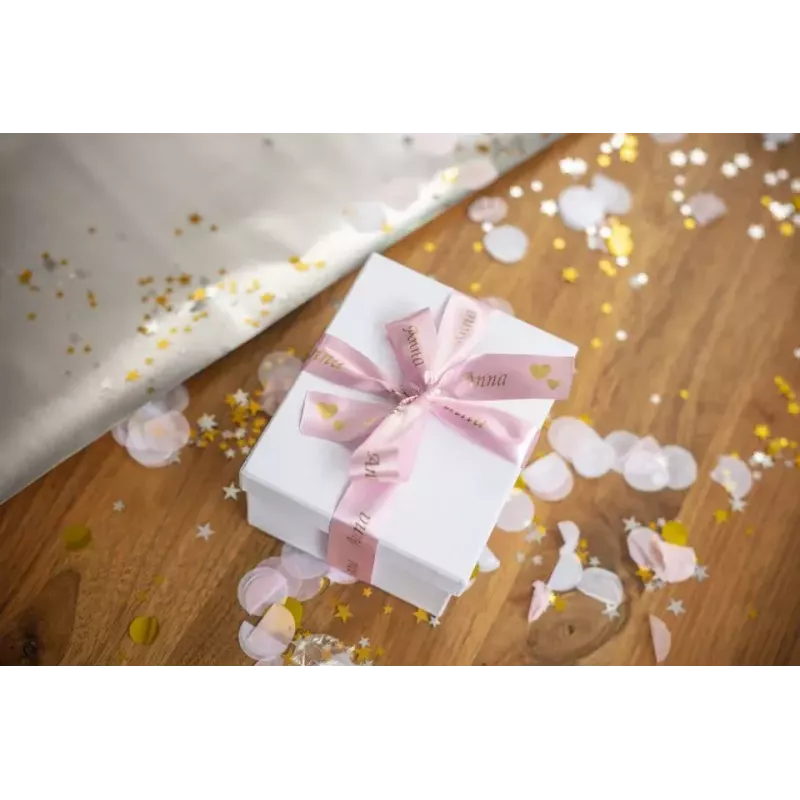 Brother TZE-RE54 Beschriftungsband Gold auf Pink