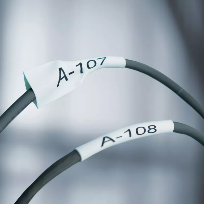 DYMO Rhino Industrial Heat-Shrink Kabel Label Tubes | 12mm x 1,5m | Schwarzer Druck auf Weiß | für Rhino Label Makers