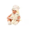 LEAN TOYS Babypuppe in Trage mit Hasen-Outfit, Beige
