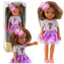 LEAN TOYS Puppe in lila Kleid mit langen braunen Haaren und Blumenhaarspange