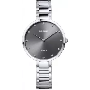 BERING Damenuhr Classic Collection Quarz 34mm blaues Sonnenschliff-Zifferblatt silbernes Milanaise-Armband 11334-772