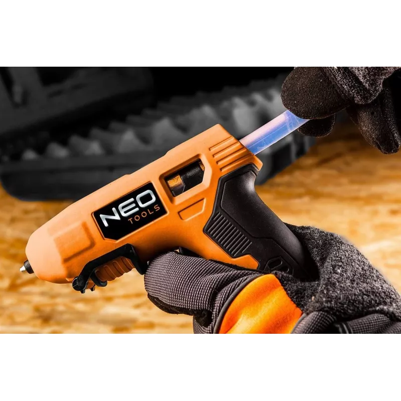 NEO Tools 17-083 20W Heißklebepistole mit Anti-Tropf-Düse, 11mm Klebestifte, integrierter Ständer, 230V, Orange/Schwarz
